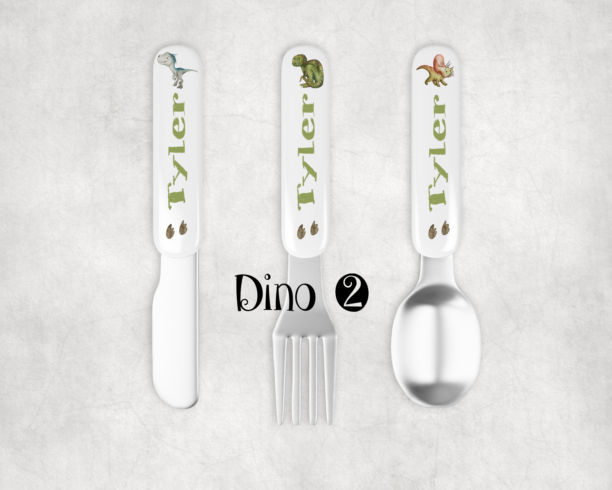 Children's personalised cutlery set in dinosaur design