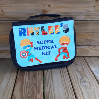 Children's Medicine Bag printed with colourful fun designs, features carry handle and hanging hook, personalised with name and any medical information, can add photos. superheros