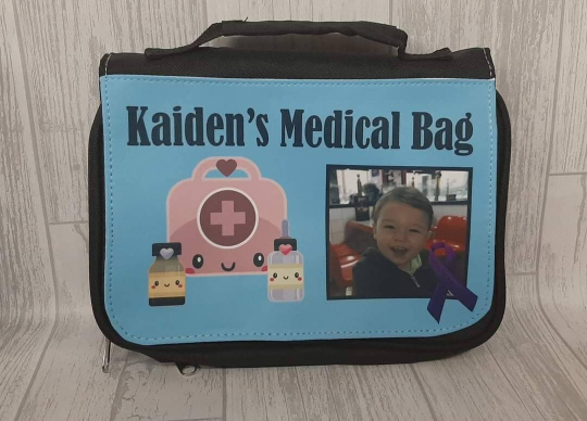 Children's Medicine Bag printed with colourful fun designs, features carry handle and hanging hook, personalised with name and any medical information, can add photos.medicine bag