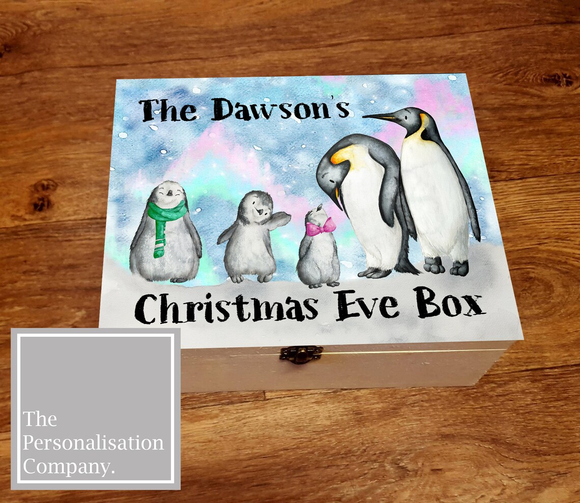 wooden christmas eve box, great for children or families especially first christmas. a luxury box with cute printed penguin family