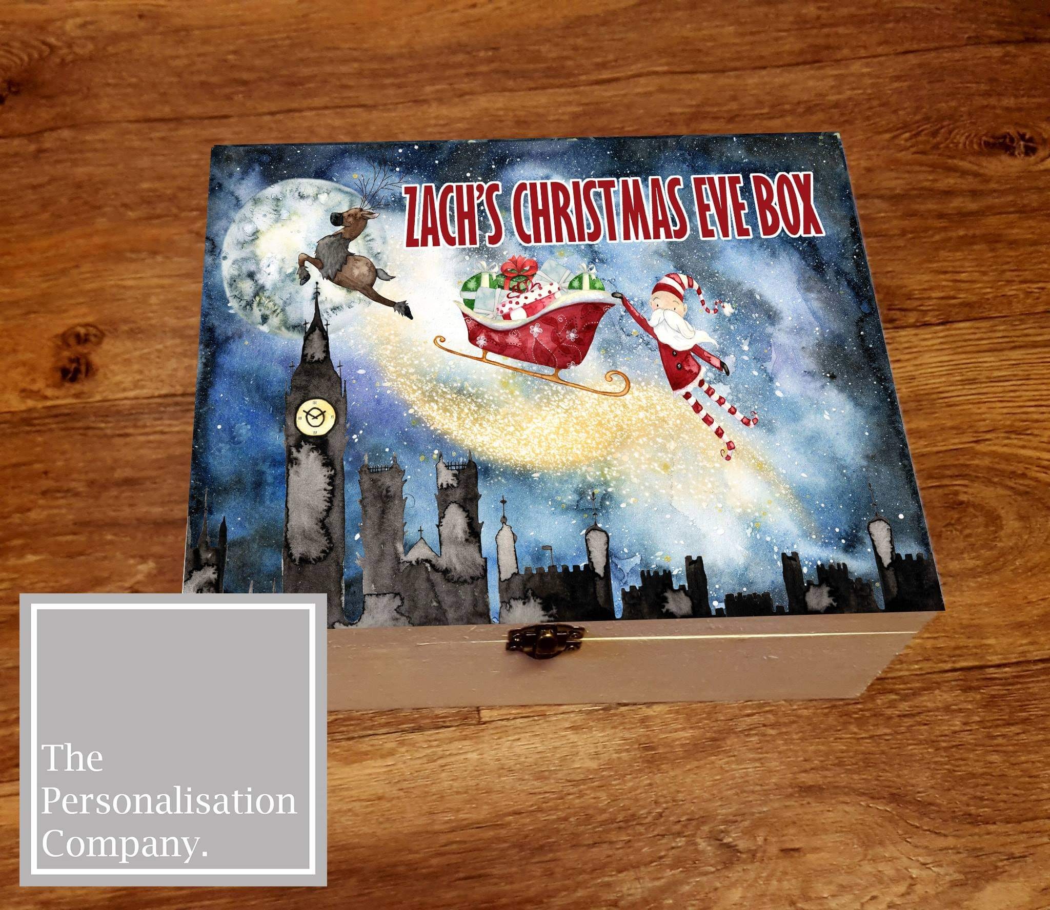 wooden christmas eve box, great for children or families especially first christmas. a luxury box with cute printed santa scene flying across london