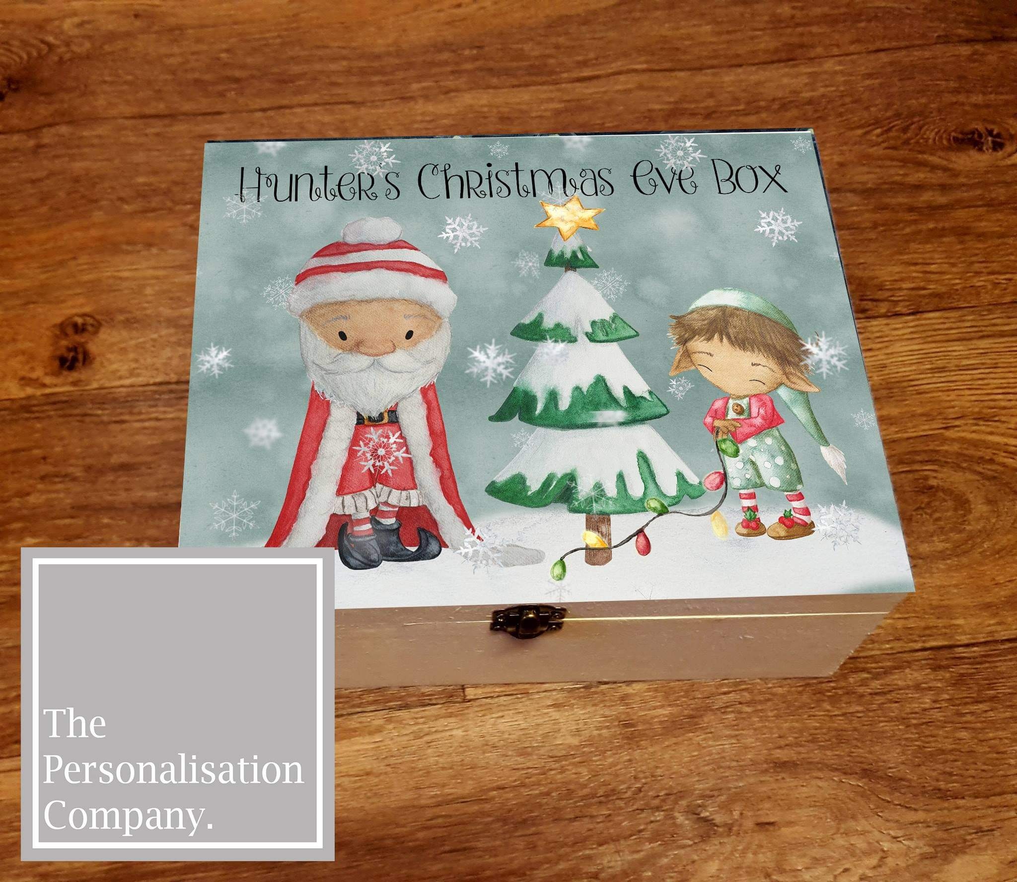 wooden christmas eve box, great for children or families especially first christmas. a luxury box with cute printed santa scene with an elf and christmas tree