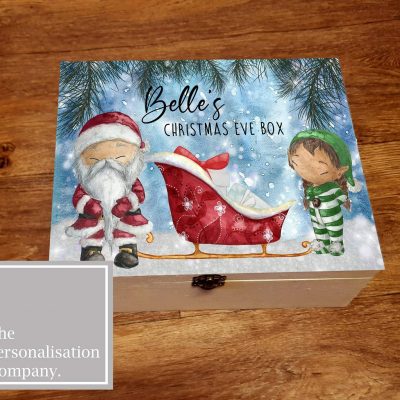 wooden christmas eve box, great for children or families especially first christmas. a luxury box with cute printed santa scene with an elf loading a sleigh