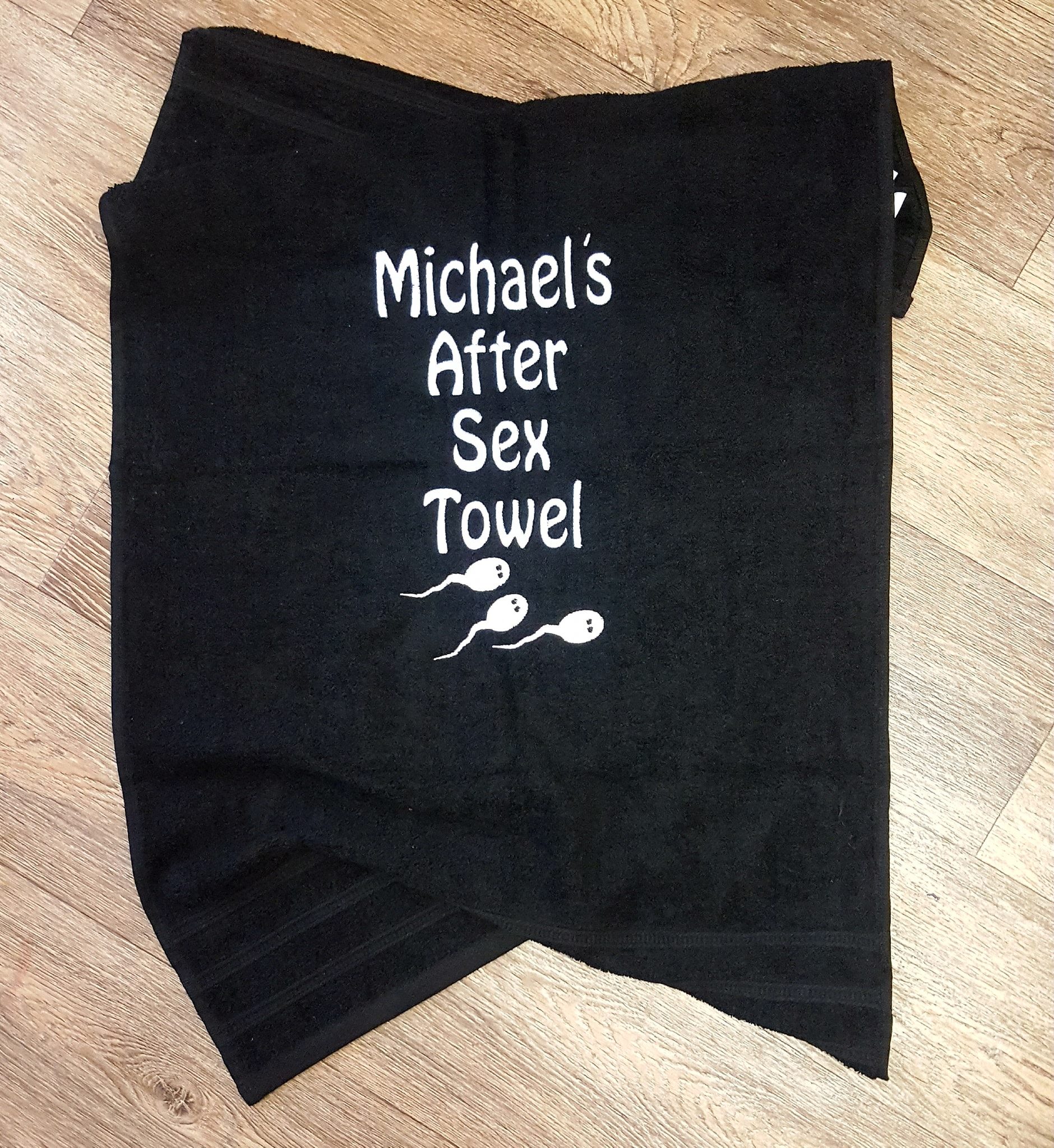After Sex Embroidered Towel in black with white embroidered personalised name with sperm
