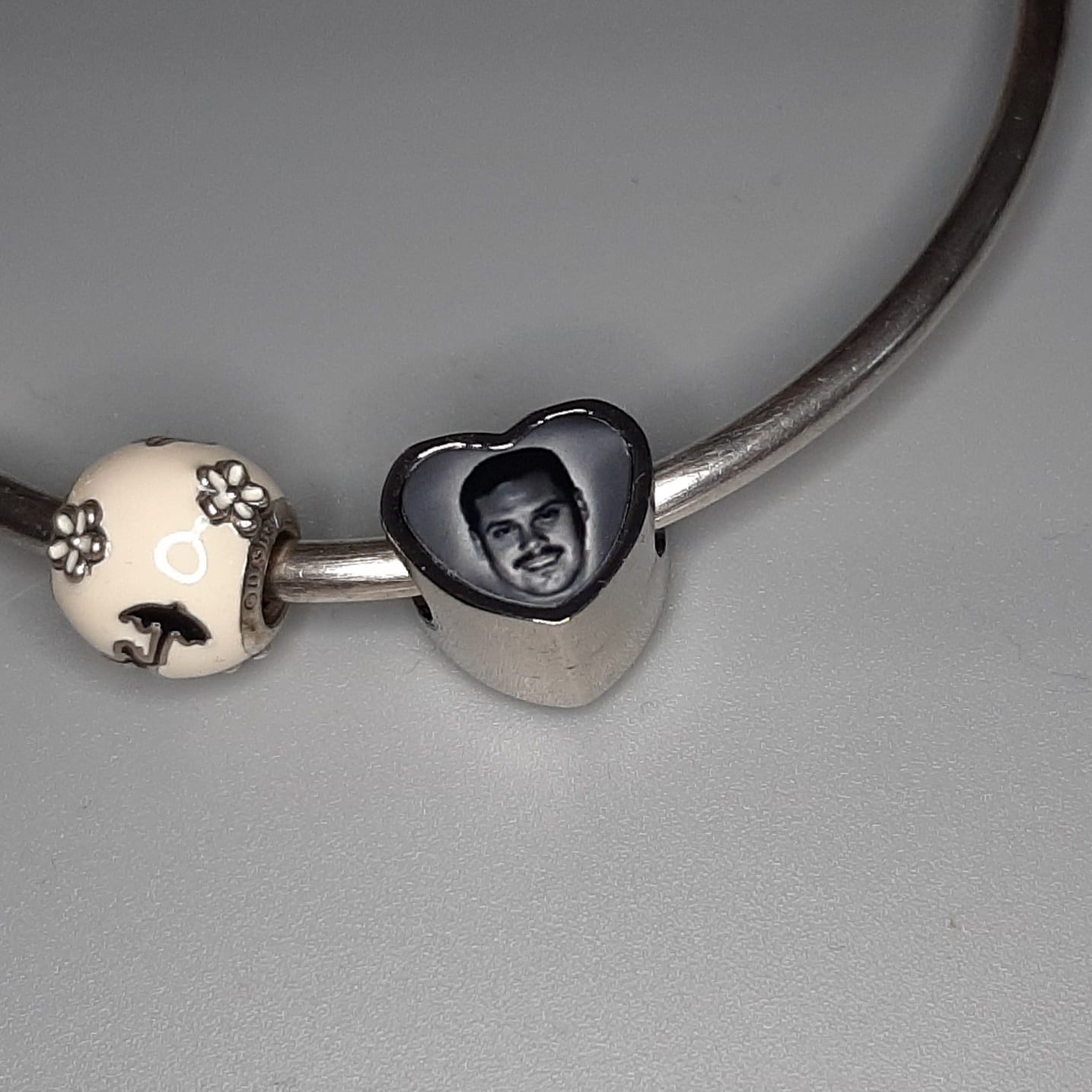 Heart Alloy Bracelet Charm on a pandora bracelet with a black and white photo