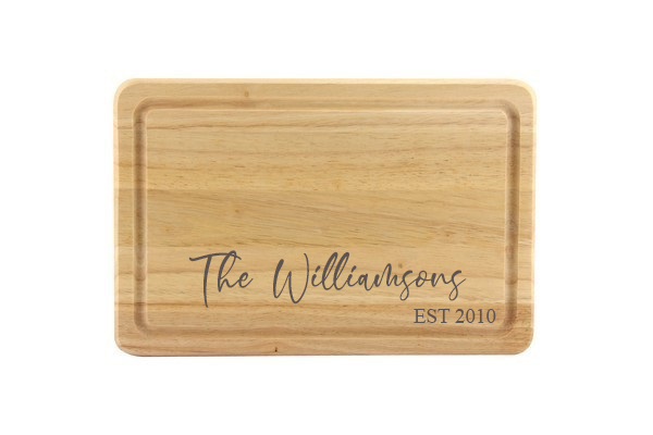 Personalised wooden chopping board. Personalised engraved beer glass. Beautiful engraved personalised gift for every occasion. Personalised gifts for daddy. This image is shown on the personalisation company website. Personalised and affordable gifts for every occassion. Visit www.the-personalisation-company.co.uk
