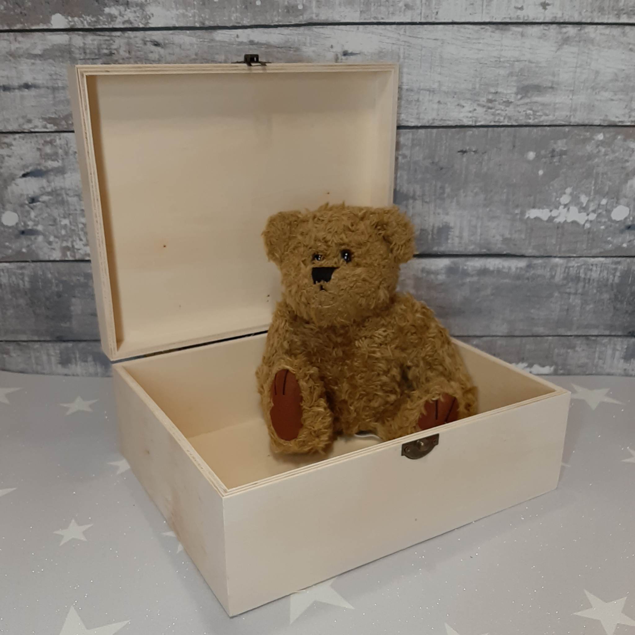 open box with teddy
