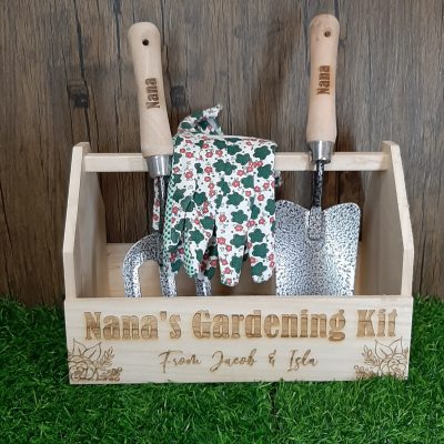 gardening kit with gloves fork and trowel