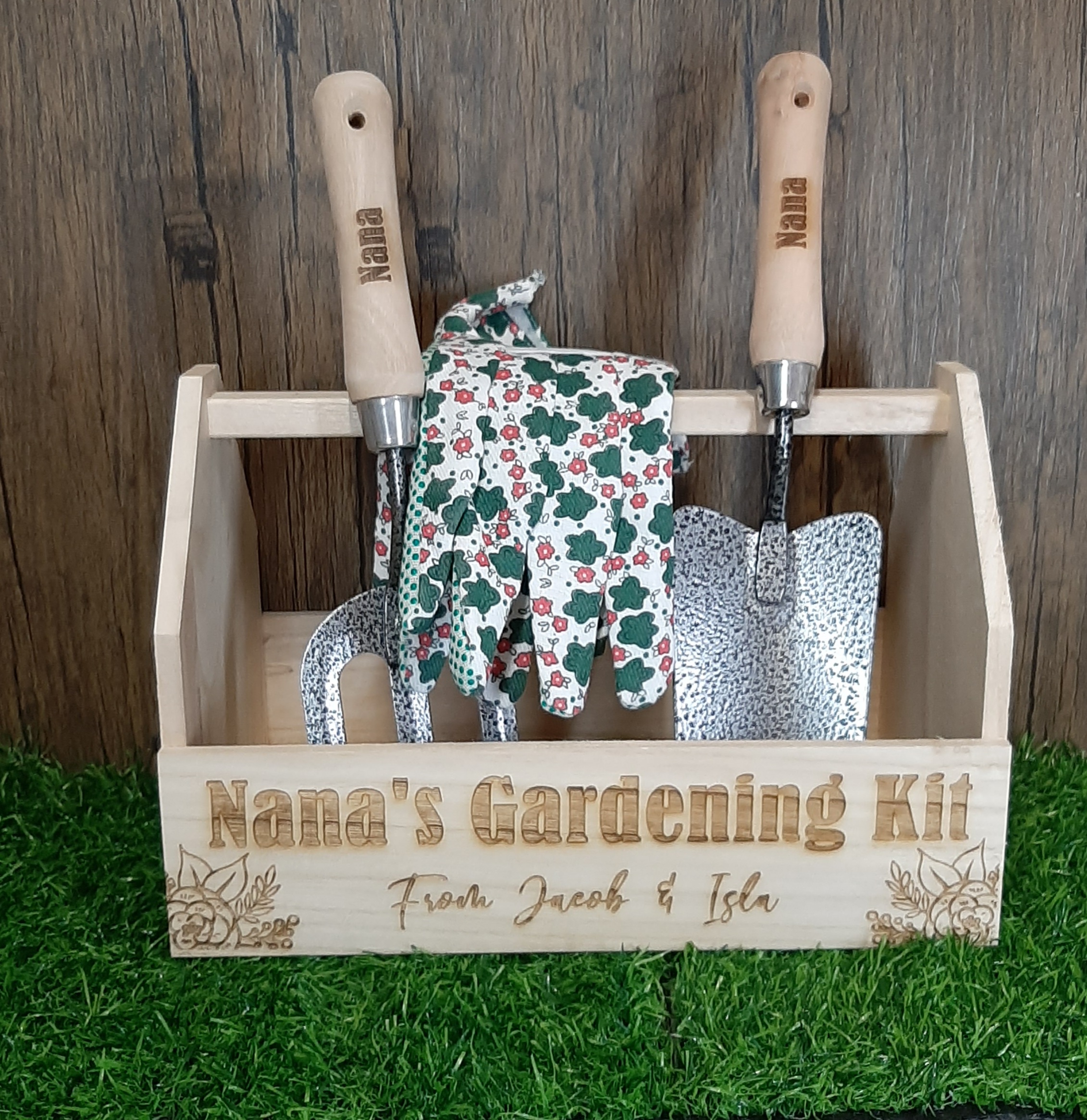 gardening kit with gloves fork and trowel