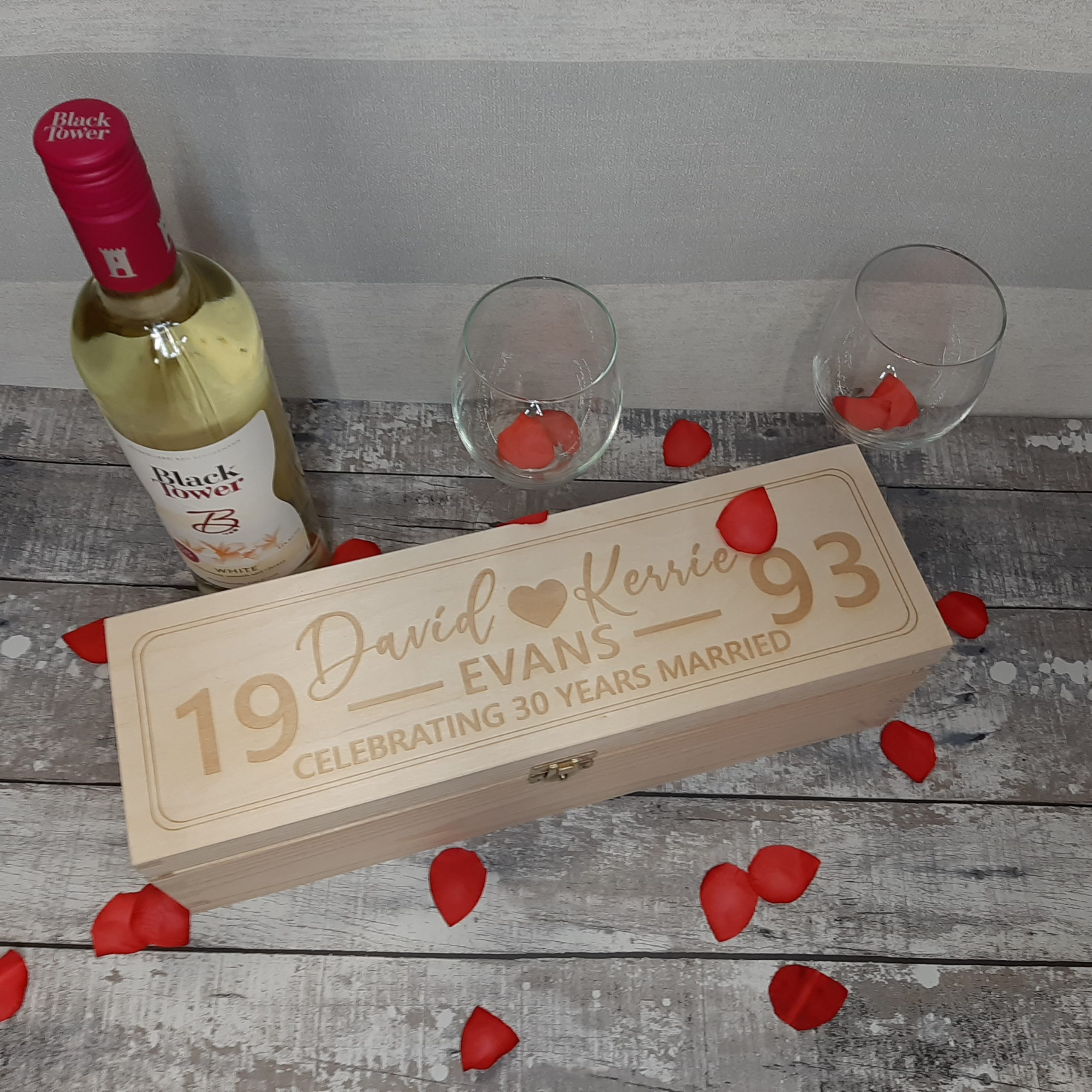 Wooden Wine Gift Box set up with wine bottle and glasses for romantic evening