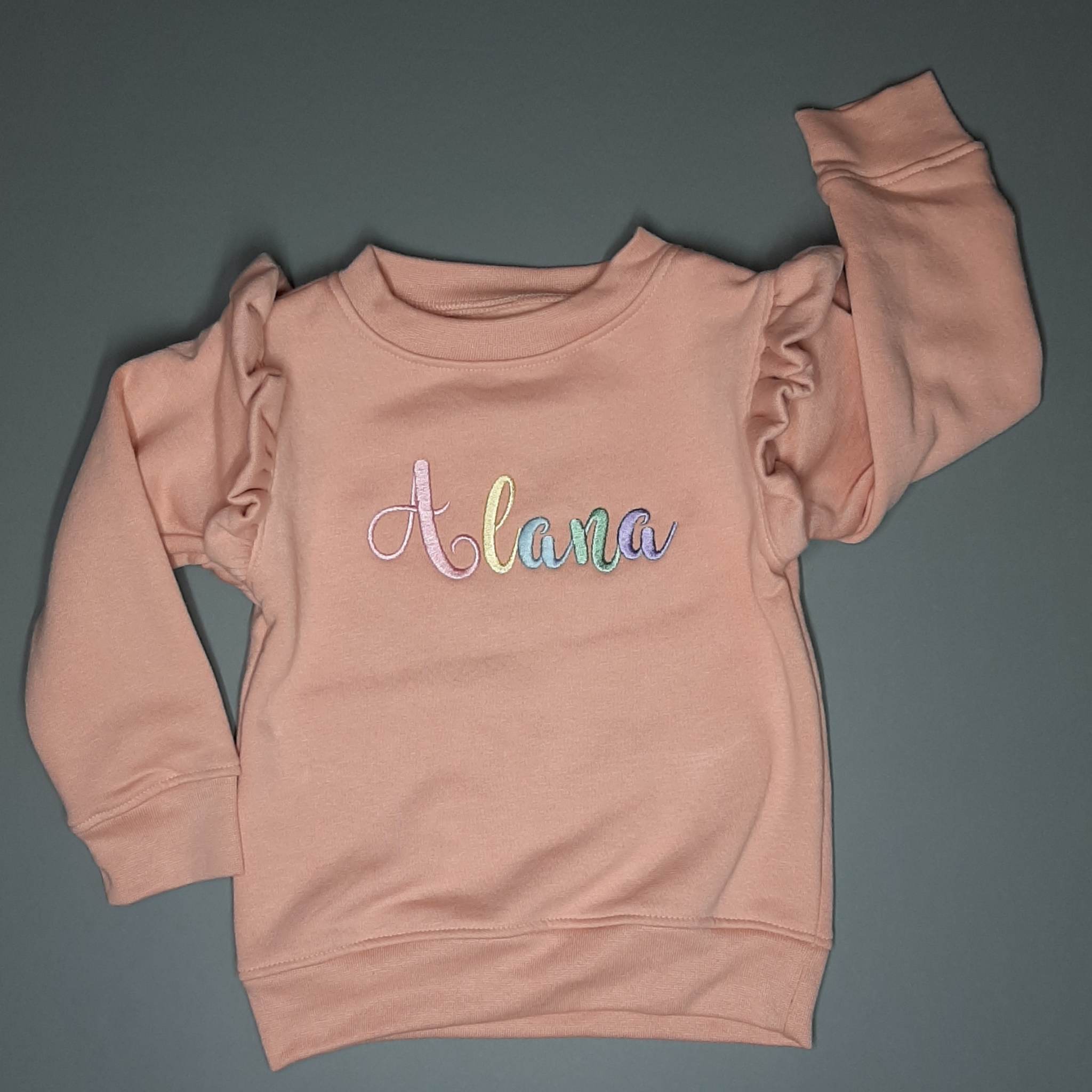 Rainbow Name Children's T Shirt/Jumper, chunky embroidered name in pastel rainbow colours
