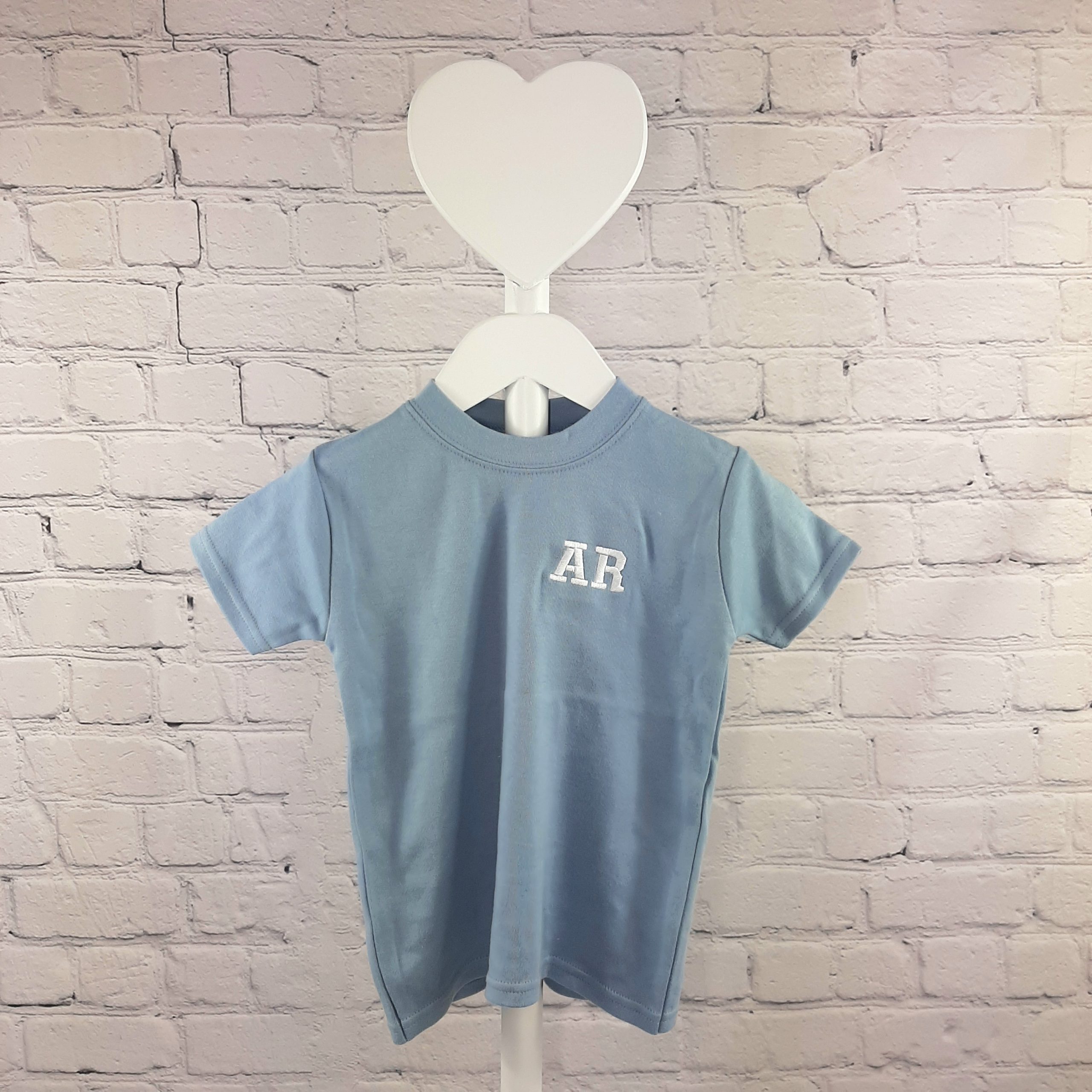 dusky blue childrens t shirt with embroidered initials