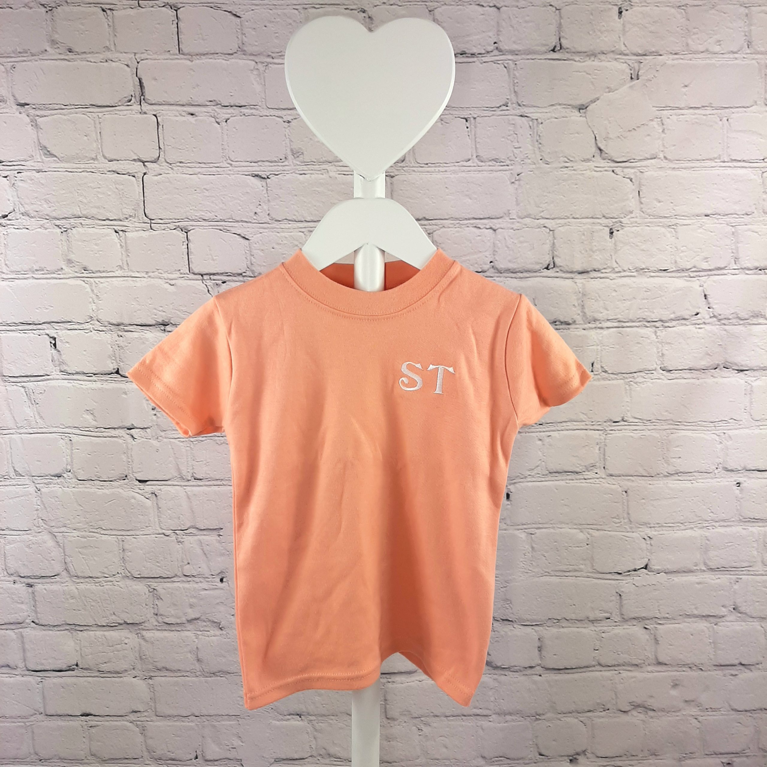 dusky pink childrens t shirt with embroidered initials