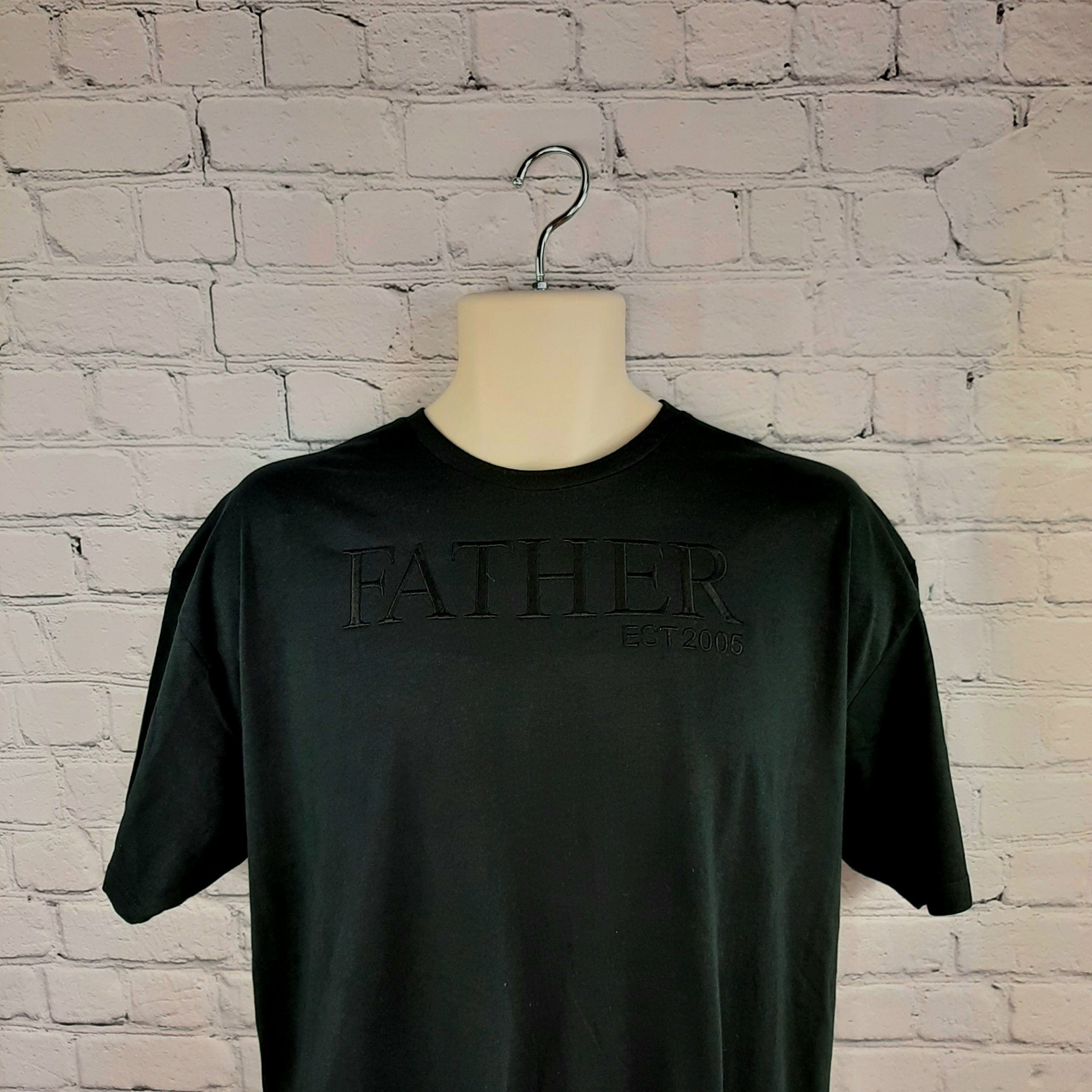 father t shirt with heavy matching embroidery established date on mannequin