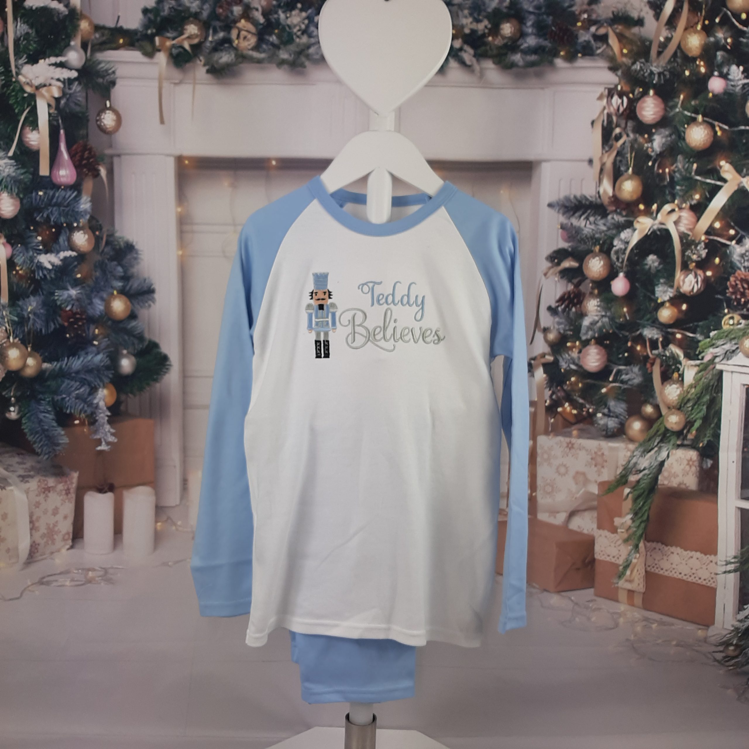 Nutcracker Christmas PJs in blue nd white for children with embroidered personalisation. Believes design