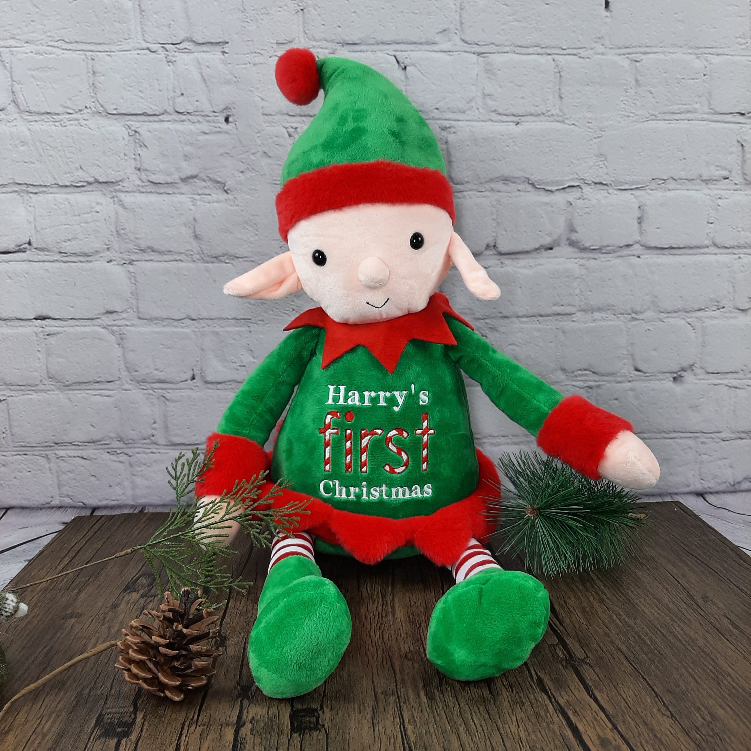large plush elf with embroidered first christmas design and personalisation. elf on shelf. first christmas