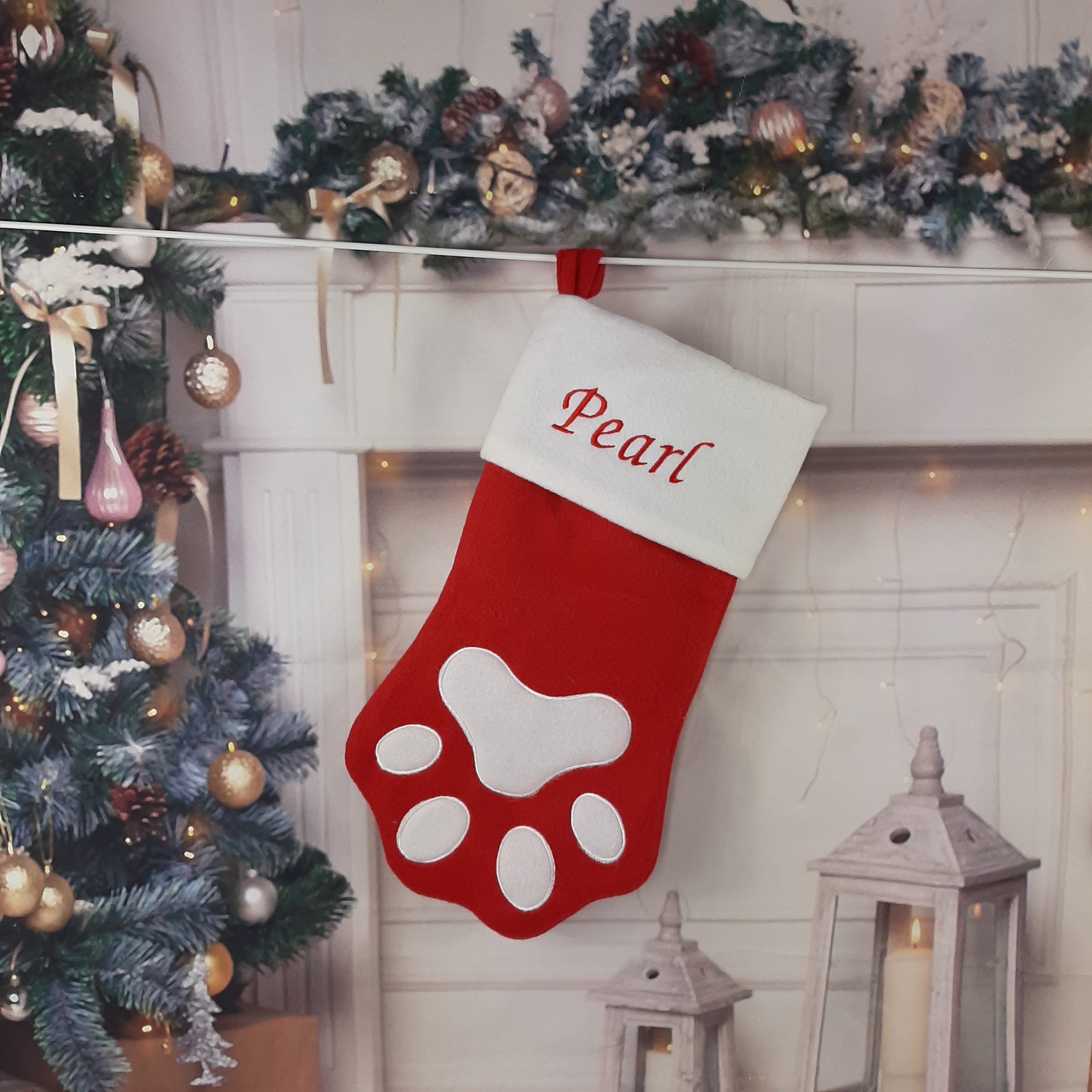 red luxury christmas stocking with embroidered personalised name in paw shape for cat or dog or pet stocking