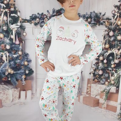 Winter Wonderland Christmas Pyjamas for Kids - Personalised with embroidery, great bargain cheap first christmas pyamas. modelled on boy standing