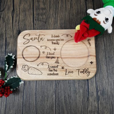Wooden personalised santa treat board with custom engraved design with name with elf first christmas