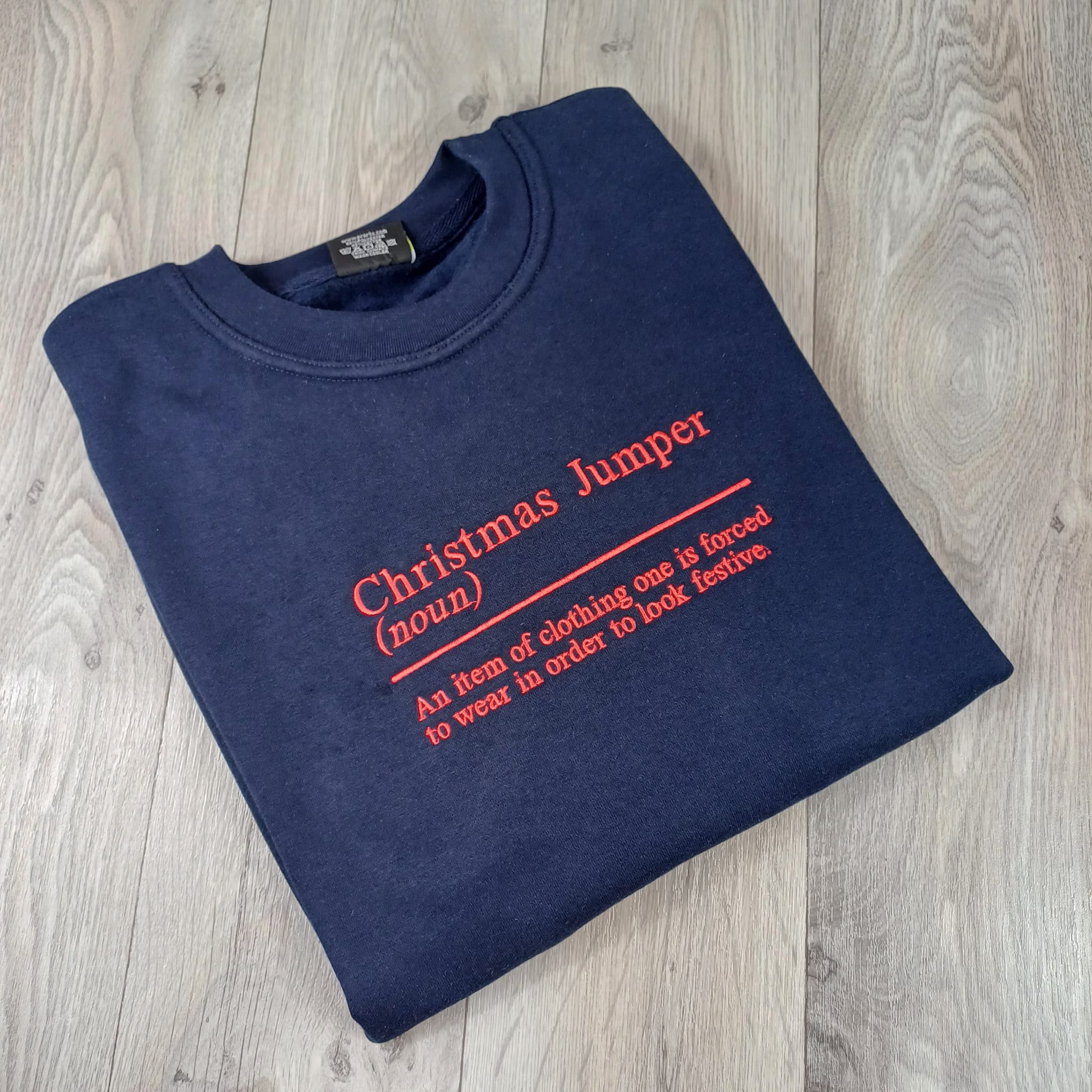 Christmas Jumper – Funny Noun Design Unisex Festive Jumper with Embroidered Christmas Definition
